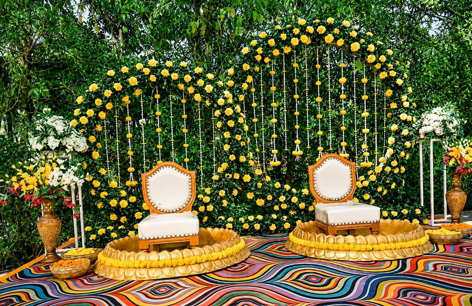 Yellow rose floral backdrop haldi stage decoration in Neral by Nilesh Decorators