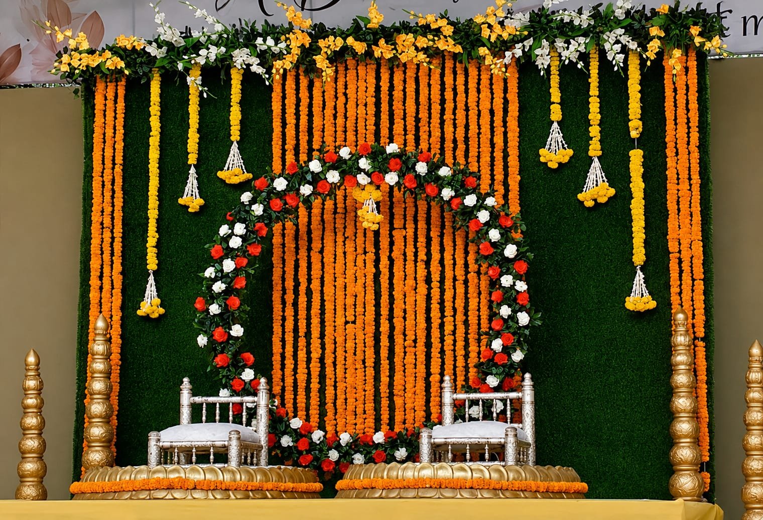 Marigold flower wedding stage with rose ring and silver chairs by Nilesh Decorators Neral