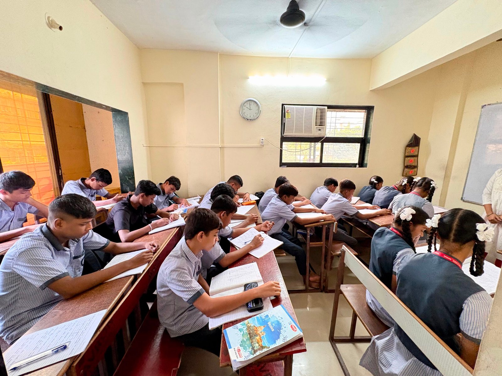Students solving questions in a Success Educare Classes Neral coaching class near NVM High School and Jr. College